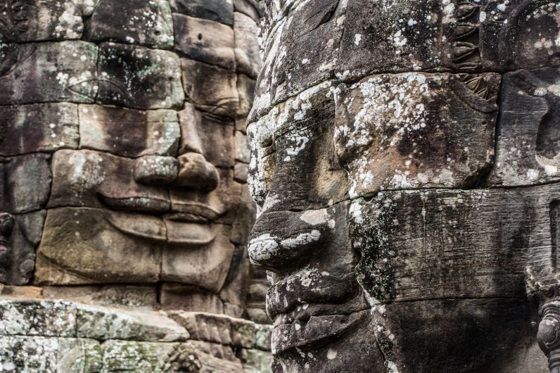 Per E-Bike durch Kambodscha - Steingesichter des Bayon Tempels ind Sieam Reap